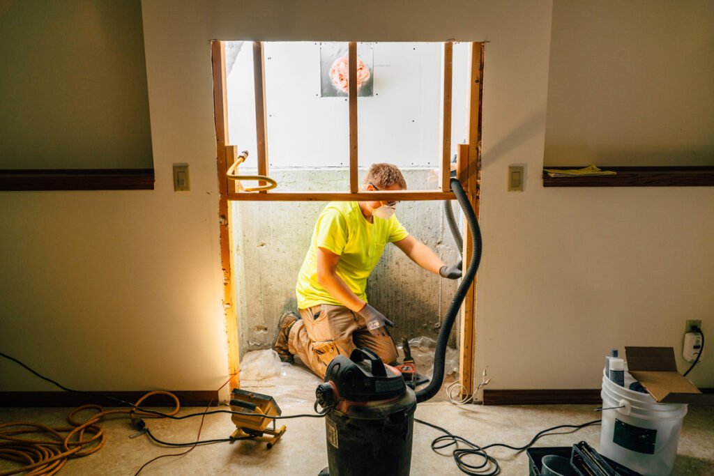 Zander employee cleaning crack site