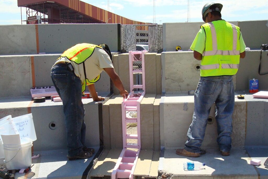 Zander employees installing expansion joints