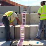 Zander employees installing expansion joints