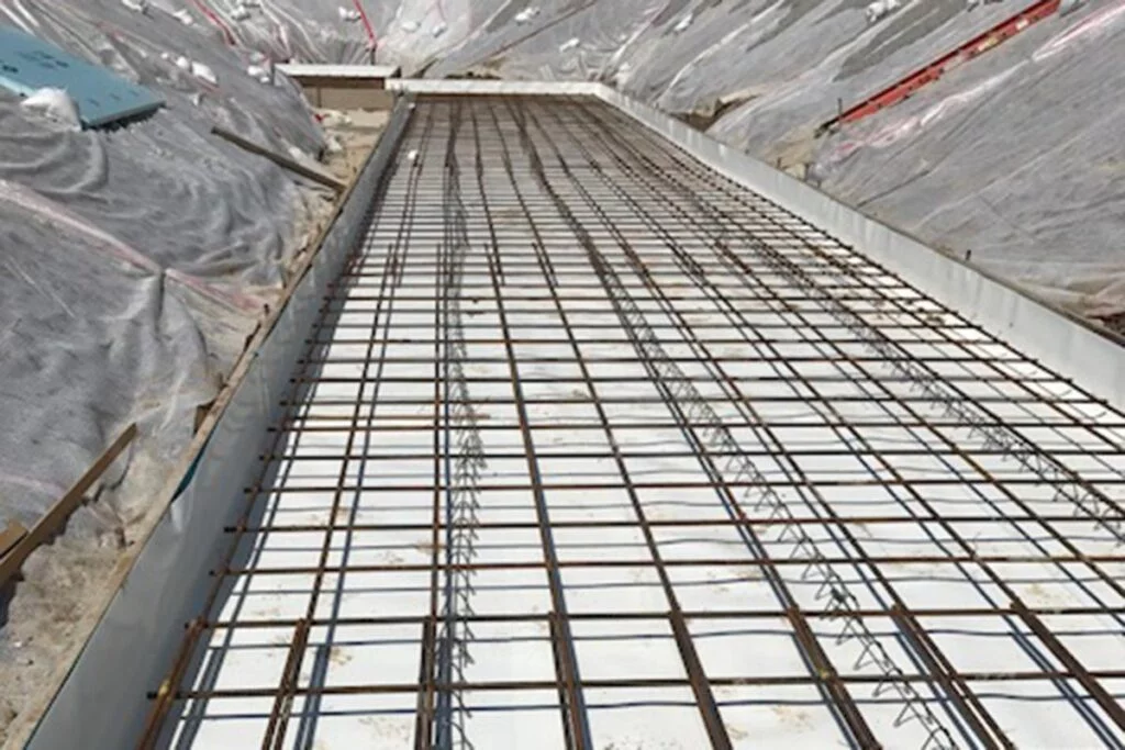 waterproof membranes being applied at a site