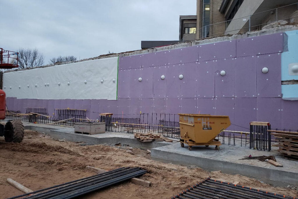 blindside panels attached to a wall at a jobsite