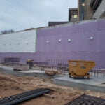 blindside panels attached to a wall at a jobsite