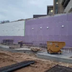 blindside panels attached to a wall at a jobsite