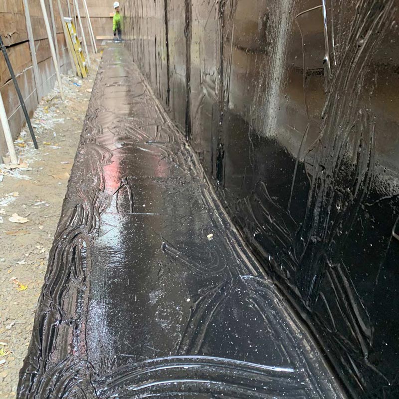 waterproof layer on outside of a wall