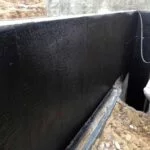wall with waterproofing applied