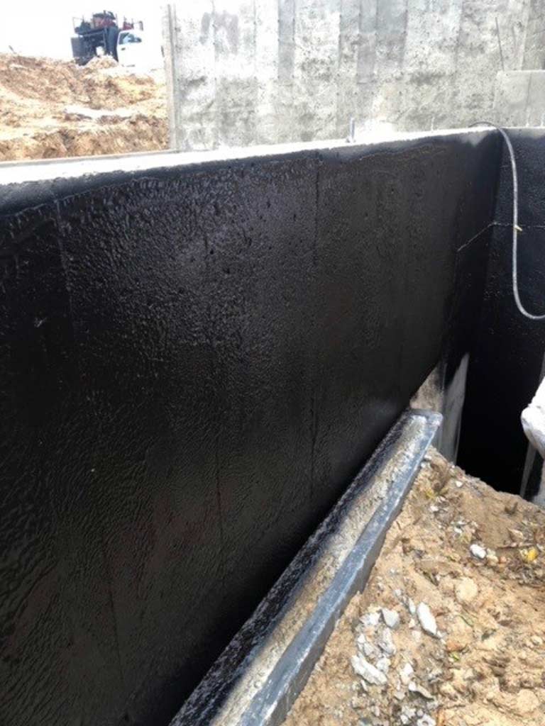 wall with waterproofing applied