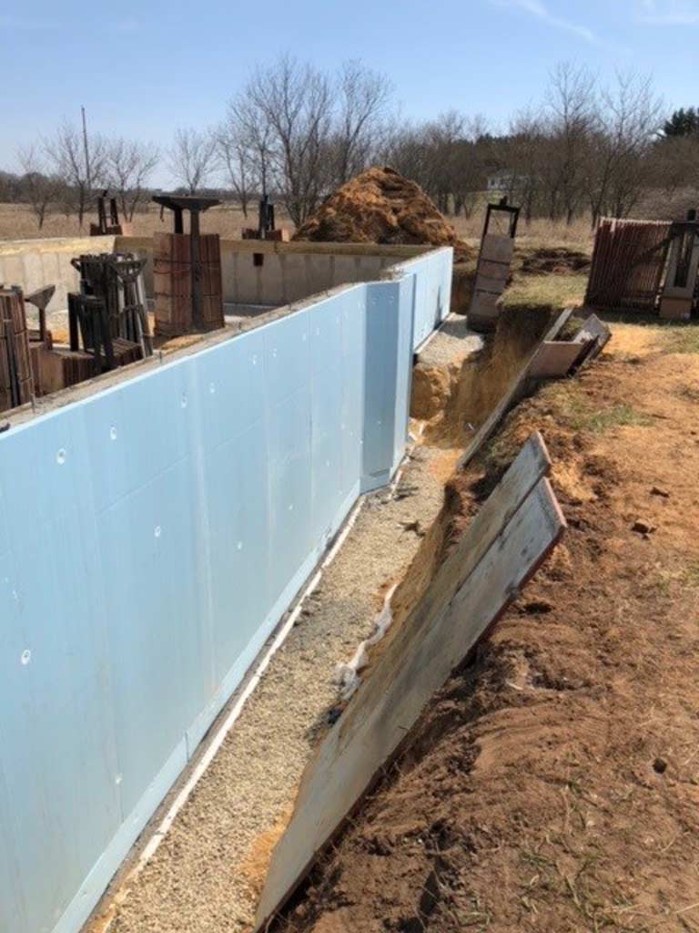 wall with waterproof panels attached