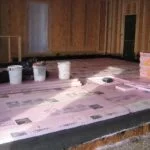 home construction with floor waterproofing