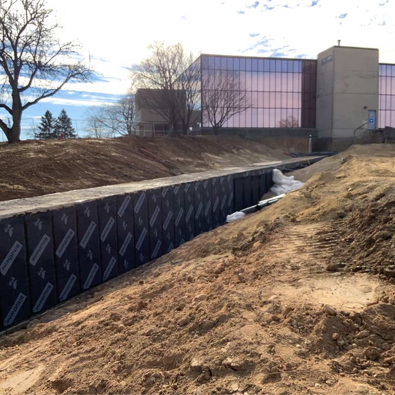 Foundation waterproofing on a jobsite