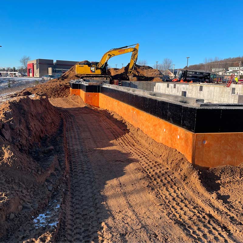 Foundation waterproofing on a jobsite
