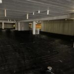 Vapor barrier on lower level of a large concrete structure