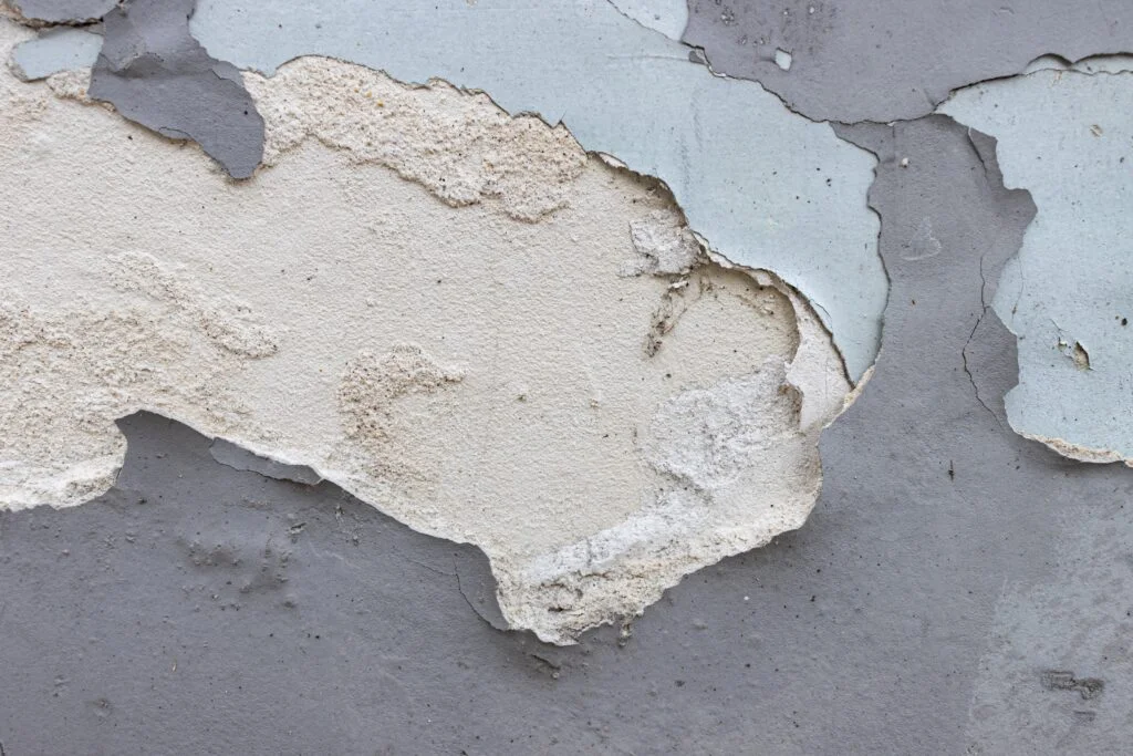 Close-up.,Heavily,Damaged,Old,Facade,Wall,.,Paint,Peeling,Off